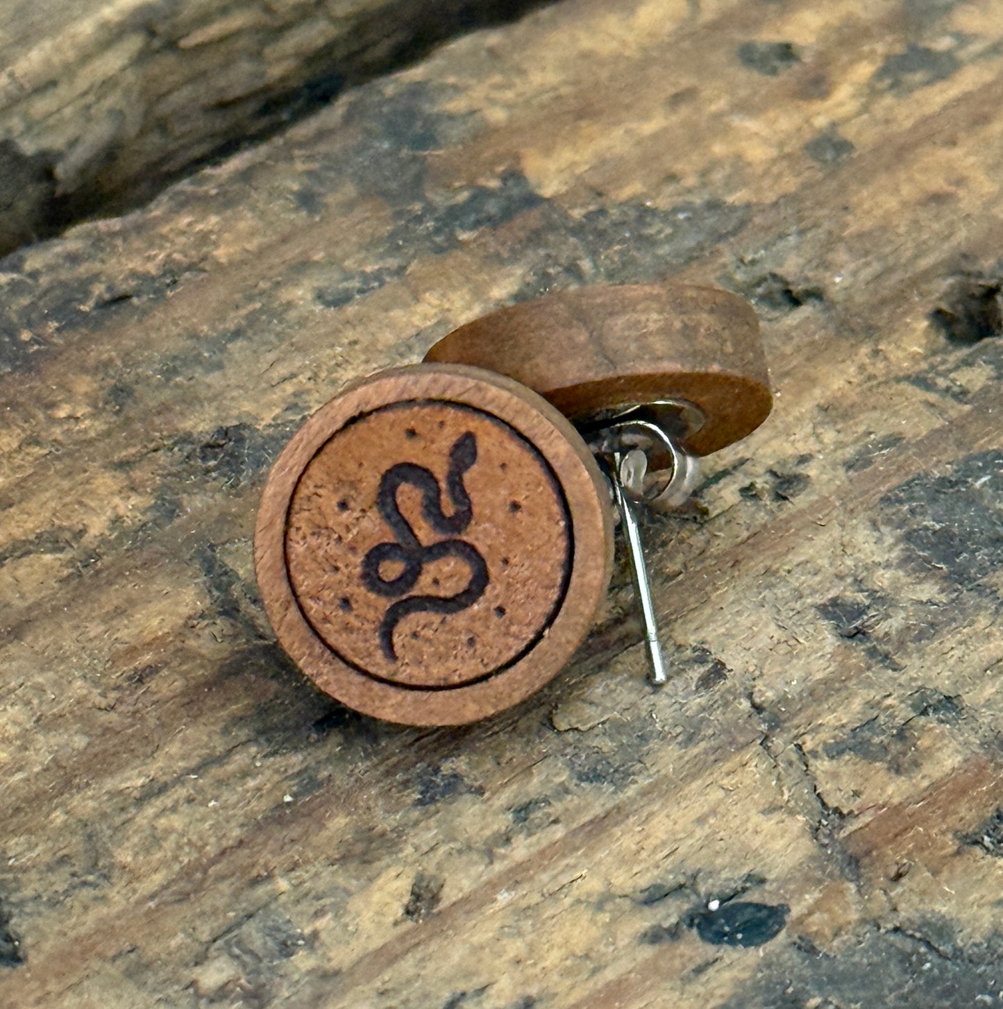 Leather And Wood serpent studs