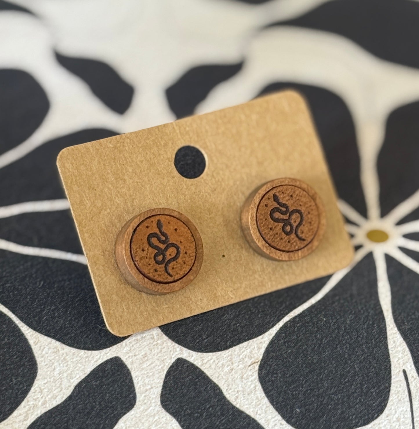 Leather And Wood serpent studs